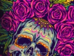 Close up of the sugar skull with a pink rose crown and painted decorative patterns in crisp linework.