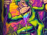 the trippy monkey face with colorful slime dripping from his grinning mouth.
